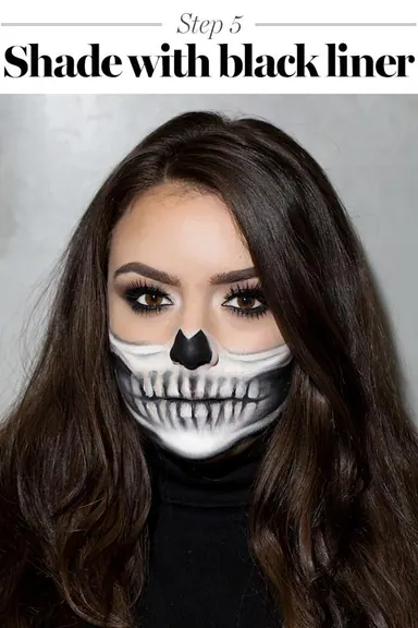 Halloween glam skull makeup portrait with white facial paint and dark contour lines